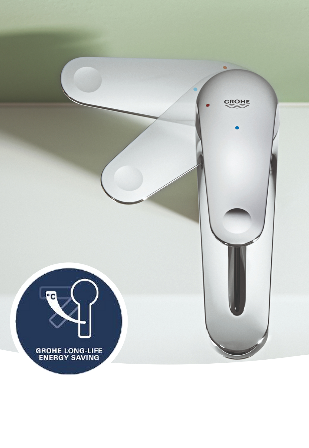 A GROHE Swift tap attached to a white sink, white tiles in background